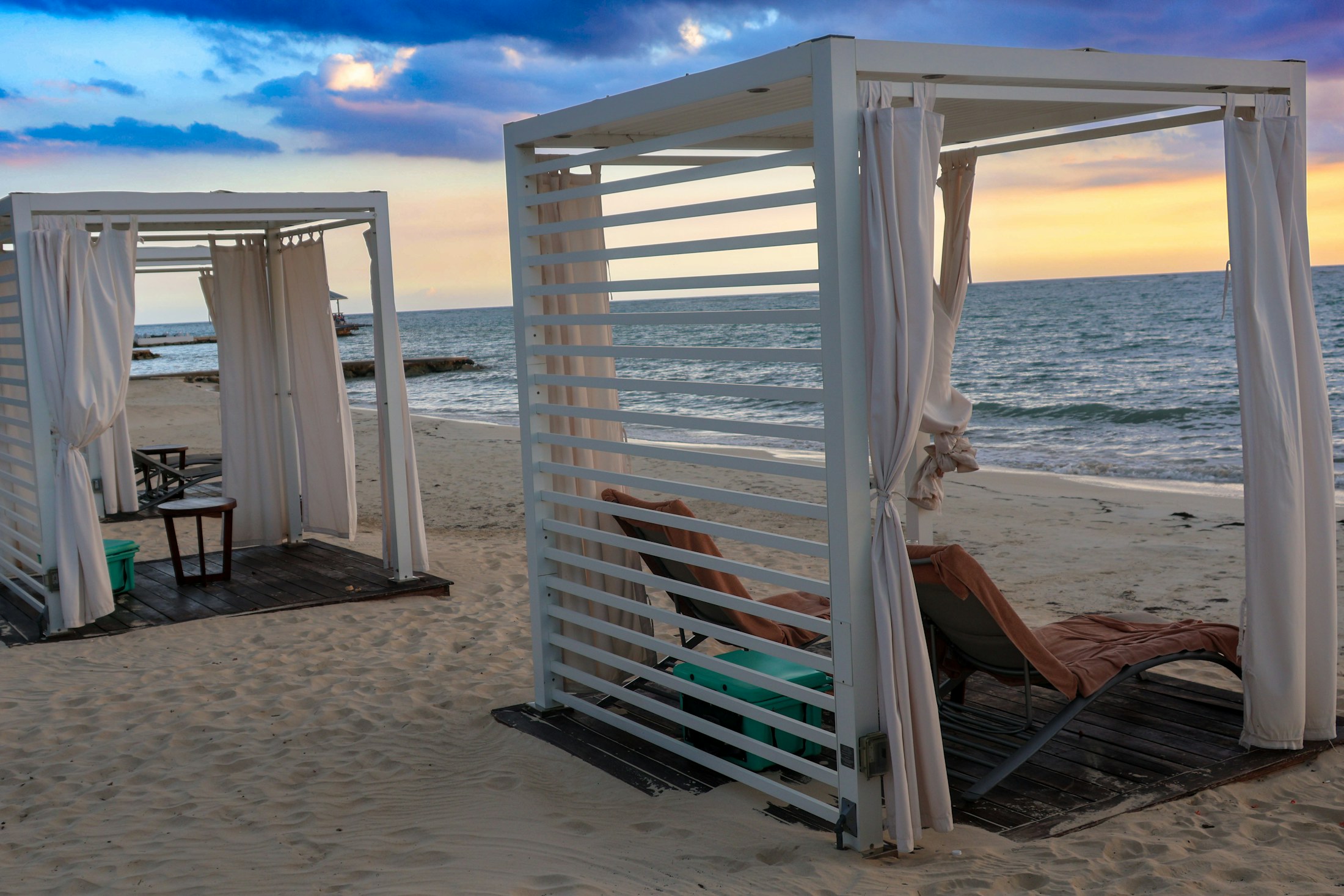 White beach cabanas by the sea